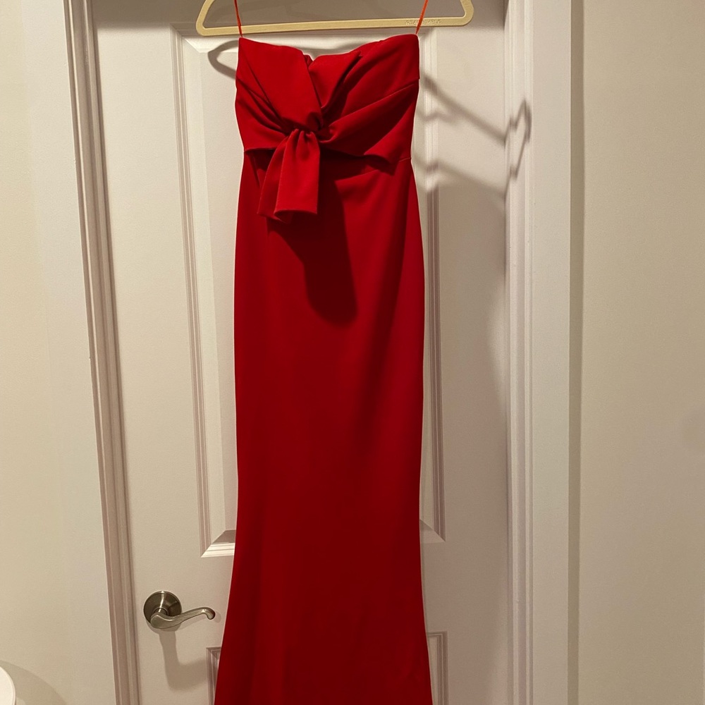 Red strapless dress. Great for prom or as a wedding guest. Size S